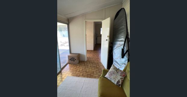 Charming 2-Bedroom Home with Sunroom and Lovely Gardens - Photo 1