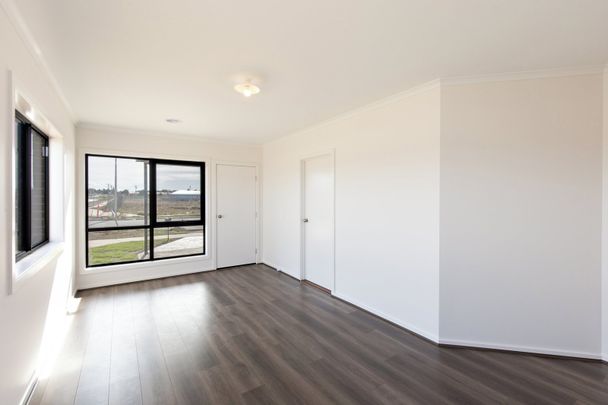 NEAR NEW THREE BEDROOM HOME IN GREAT LOCATION - Photo 1