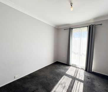 Peaceful Suburban Living in a Central, Well-Connected Location - Photo 6