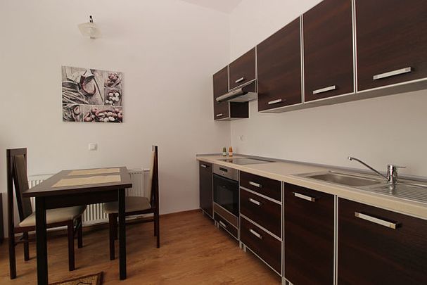 Kawalerka z ogródkiem na nowym osiedlu. - Zdjęcie 1