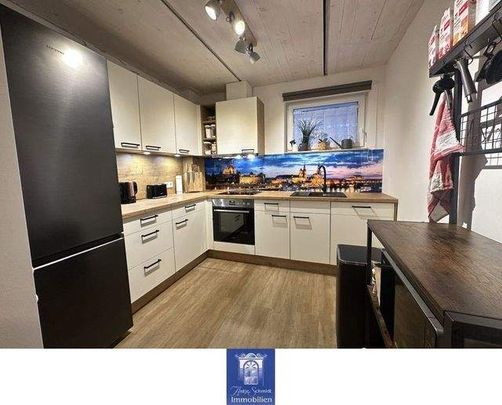 Traumhafte Neubauwohnung mit großem Balkon! - Foto 1