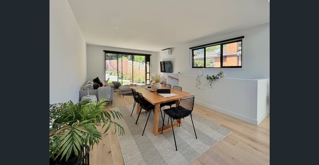 Modern Townhouse with Stylish Design and Prime Location - Photo 1