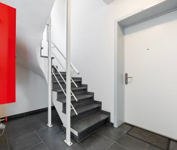 KNAP APPARTEMENT MET 1 SLAAPKAMER EN STAANPLAATS IN SINT-TRUIDEN - Photo 6
