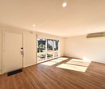 Newly refreshed two bedroom home in ideal location - Photo 3