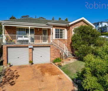 Elevated three bedroom modern home with double garage - Photo 1