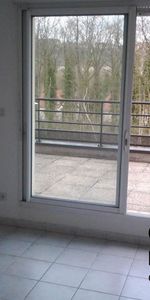 T2 AVEC BALCON ET PLACE DE PARKING - Photo 3