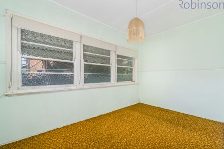 Three bedroom home with retro features. Pets considered! - Photo 5