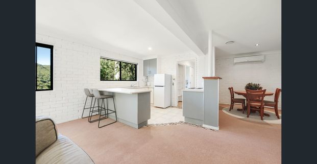 Well-Presented Downstairs Home Offering Comfort, Convenience and Outdoor Living - Photo 1