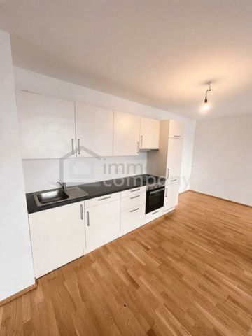 Neuwertige 2-Zi Wohnung in 1100 Wien mit Balkon, Garage Stellplatz & Fußbodenheizung! - Photo 4