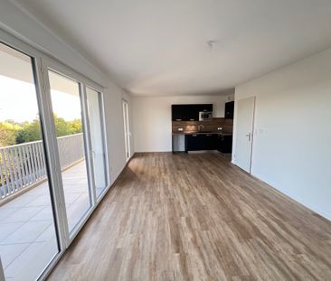 Location Appartement 3 pièces 68m² ST JEAN DE LA RUELLE 45140 - Photo 2