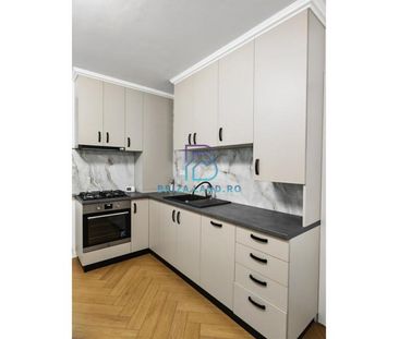 Bd. Unirii, Traian, et. 1, sup. 50mp, complet renovat 2025, mobilat - Fotografie 1