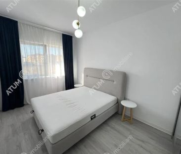 De inchiriat apartament 2 camere decomandate balcon loc propriu de parcare situat in Selimbar Sibiu - Photo 4