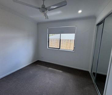 Brand New Four Bedroom Home! - Photo 1