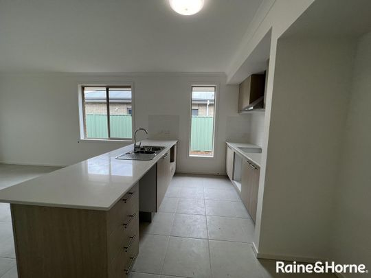 Four Bedroom - Two Living Home in Evanston Gardens! - Photo 1