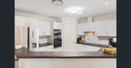 Perfectly Positioned in a Peaceful, Family-Friendly street - Photo 3