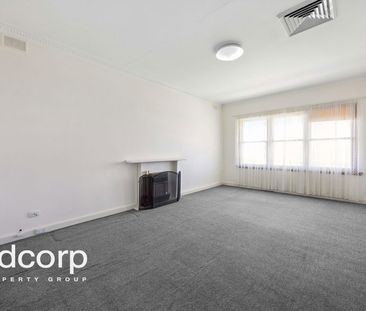 Three-Bedroom Home with Ample Parking - Photo 1