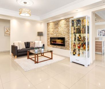 Spacious Family Home with Multiple Living Areas - Photo 1
