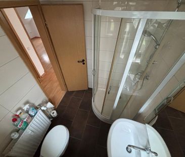 Großzügige Dachgeschosswohnung in zentraler Lage in Knetterheide - Photo 5