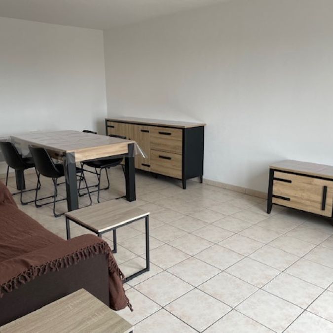REMICOURT EN RESIDENCE SECURISEE AVEC BALCON ET PARKING - Photo 1