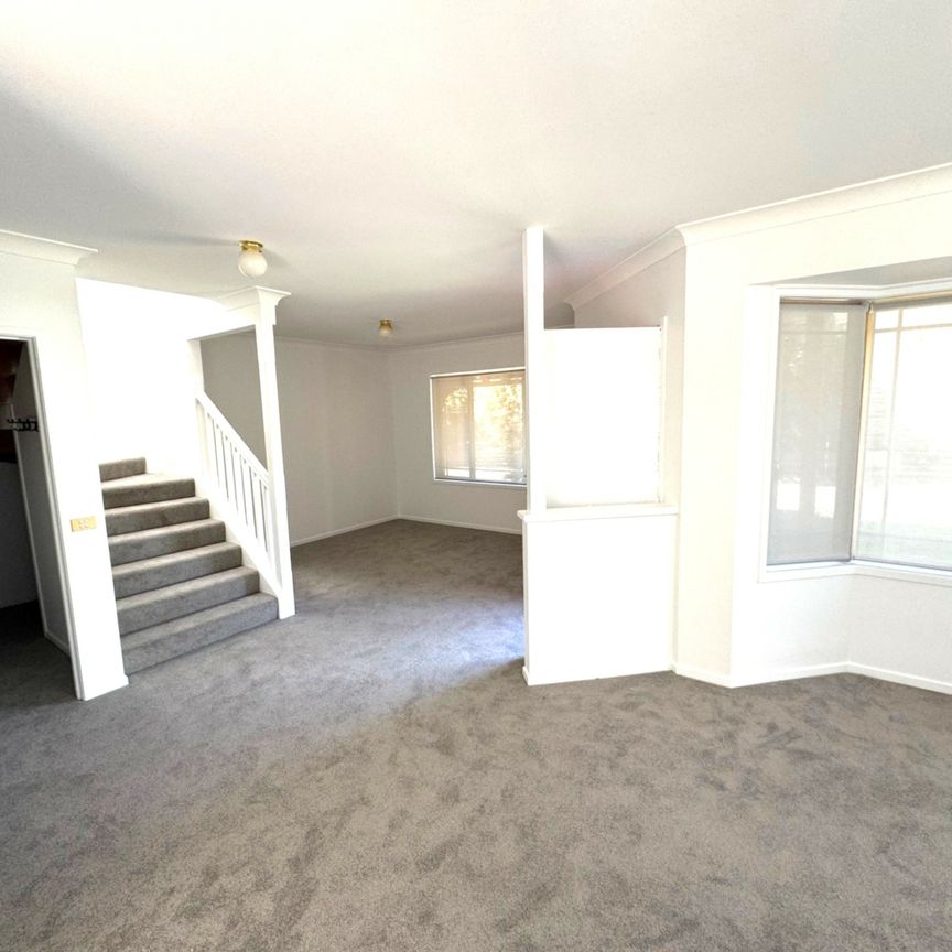 Spacious 3 Bedroom Townhouse in Fabulous Location - Photo 1
