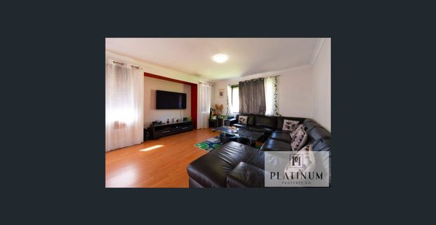 Spacious 4-Bedroom Family Home - Photo 1