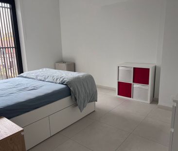 Nieuwbouwappartement met 2 slaapkamers, ruim terras en autostaanpla... - Photo 3