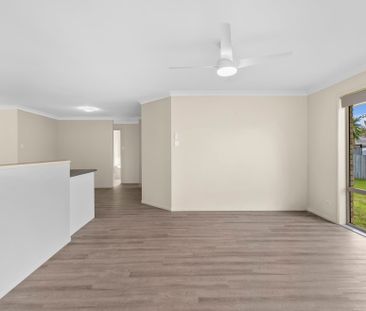 SPACIOUS 4-BEDROOM FAMILY HOME IN THE HEART OF FOREST LAKE! - Photo 1