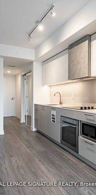 LIBERTY VILLAGE LIFESTYLE 2 BEDS 1 BATH ZEN CONDO - Photo 1