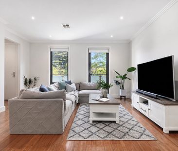 Stylish Living with Dual Ensuites & Leafy Balconies - Photo 1