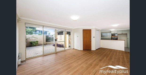 Stylish Townhouse Living in a Peaceful Leafy Street - Photo 1