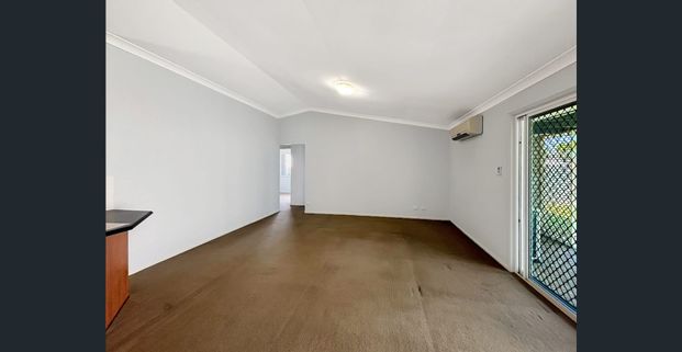 Spacious 4-Bedroom Family Home in Prime Location - Photo 1