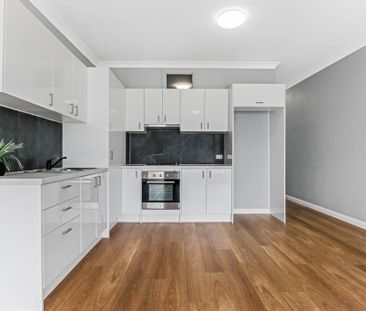 Coastal Convenience - Quiet Top-Floor Living - Photo 4