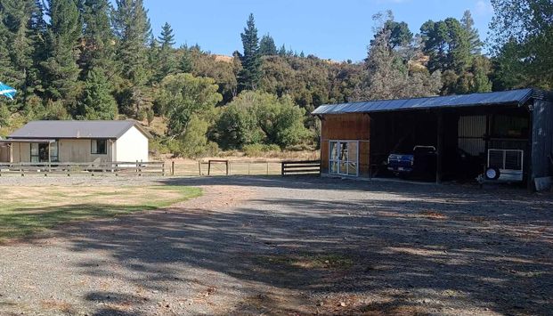 Charming Home with 15 acres of fully fenced land - Photo 1