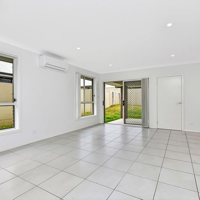 NEAR NEW LOW MAINTENANCE FAMILY HOME - Photo 1