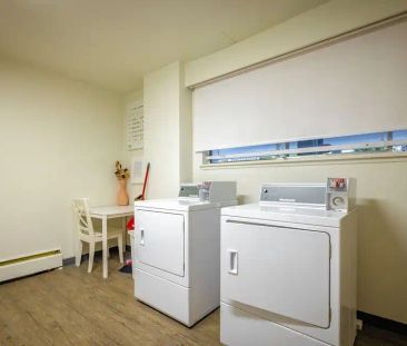 Hollyhill Towers — 2 Bedroom available at 1665 Duchess Ave, West Vancouver - Photo 2