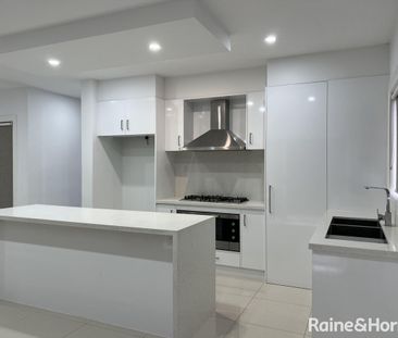 Modern Living in a Thriving Location! - Photo 5