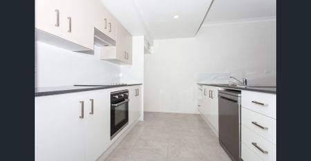 NEAR NEW 4 BEDROOM HOME - Photo 5