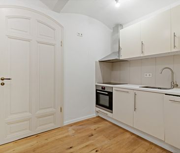 Charmante 2-Raumwohnung mit Einbauküche am Kirchtor! - Photo 1