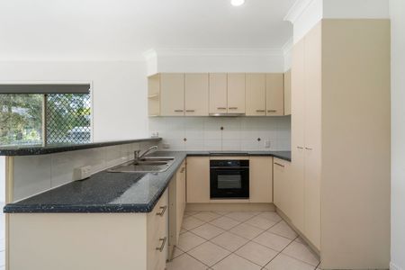 Coastal Comfort Awaits: Your Modern Haven in Woody Point - Photo 2