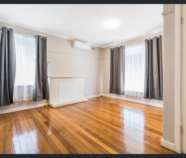 Convenient & Comfortable Living in Prime Location - Photo 1