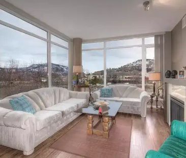 Waterscapes Skye Tower Corner Unit! | 1075 Sunset Drive, Kelowna - Photo 1