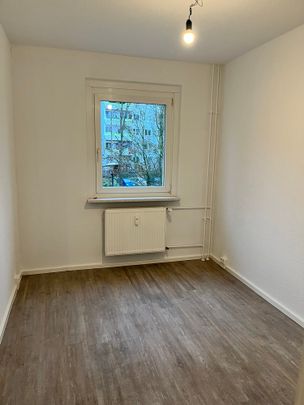 Ihre Familienwohnung mit tollem Ausblick vom Balkon - Foto 1