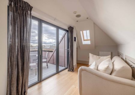 Elevate your lifestyle in this unique residence where modern sophistication meets historic charm. - Photo 3