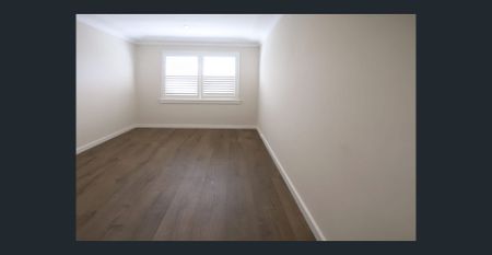 Oversized Bright and Airy 2 Bedroom with Garage - Photo 3