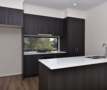 Modern Coastal Living Over Three Spacious Levels - Photo 4