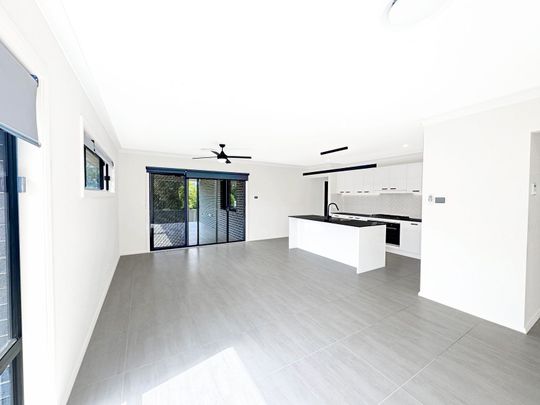 Stylish Family Home in the Heart of Aberglasslyn - Photo 1