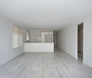 Modern 3-Bedroom Courtyard Home in a Coastal Lifestyle Location - Photo 1