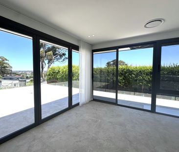 LUXURY NEWLY RENOVATED THREE-BEDROOM HOME WITH BREATHTAKING ELEVATE... - Photo 1