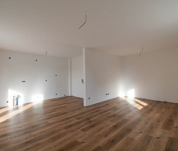 6652 - Helles und modernes Wohnen! NEUBAU-Erdgeschosswohnung in zen... - Foto 1