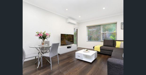 Stylishly Renovated Apartment - Photo 1